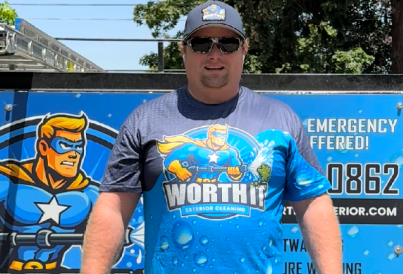 Ben Wirth, owner of Worth It Exterior Cleaning in front of his truck trailer equipment